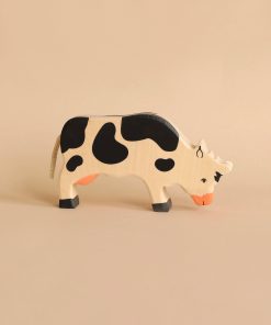 Holztiger Grazing Black Cow