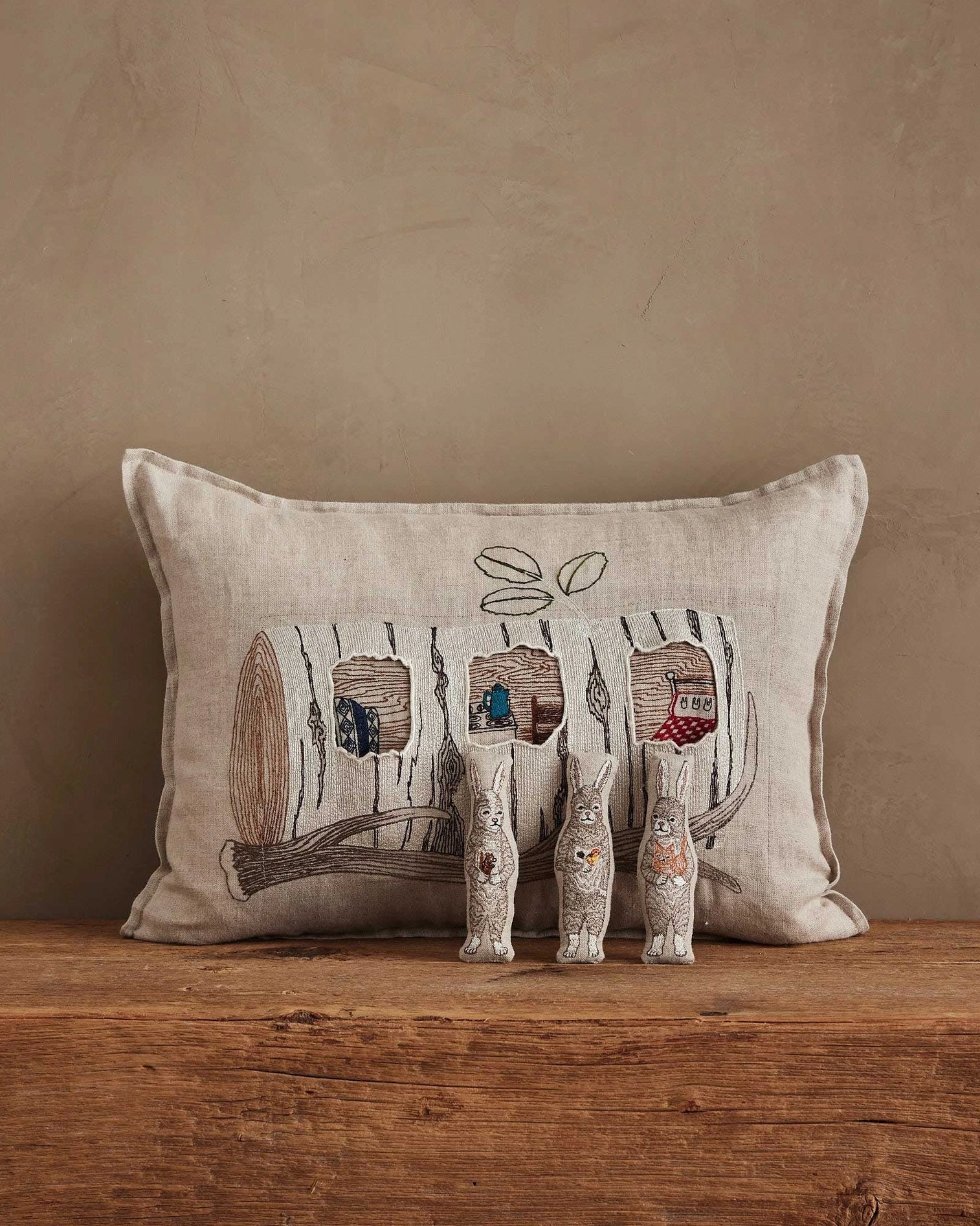 Coral & Tusk Aspen Log Bunnies Pocket Pillow